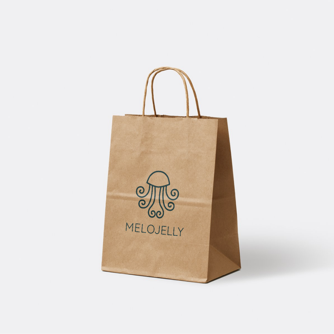 A paper shopping bag with MeloJelly's logo.